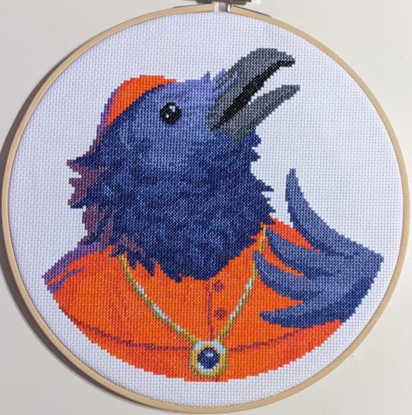 Photo of 'Cardinal Raven' finished cross stitch project